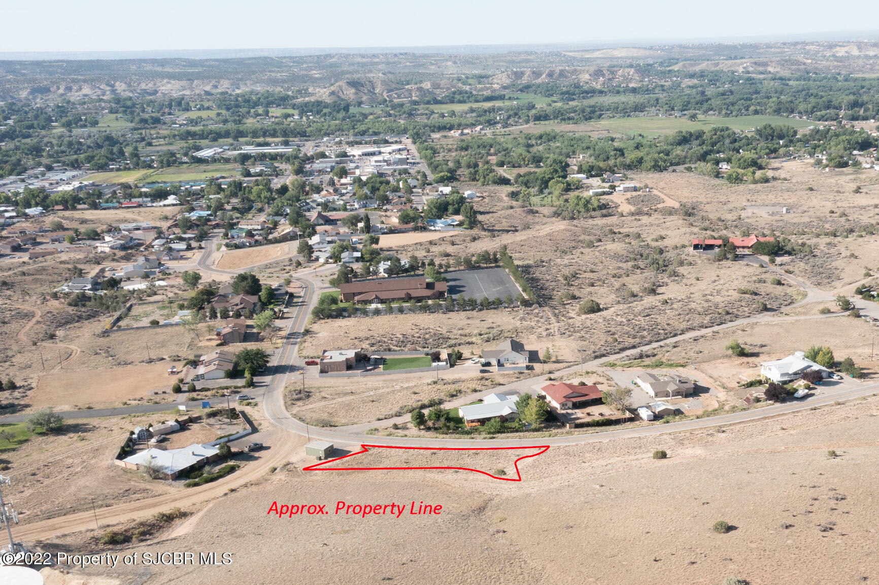 Property Photo:  703 Airport Drive  NM 87410 