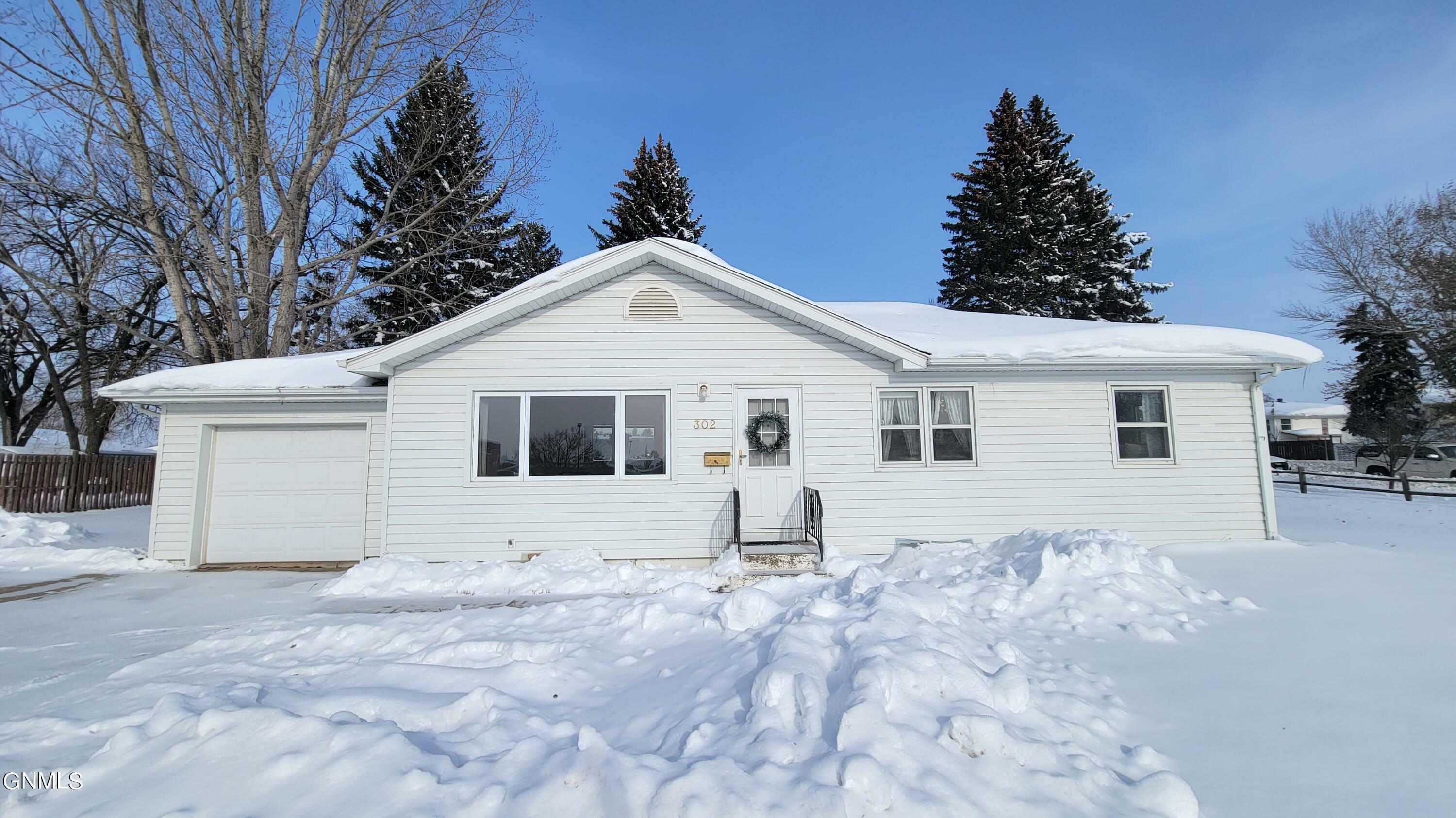 Property Photo:  302 Divide Avenue  ND 58501 
