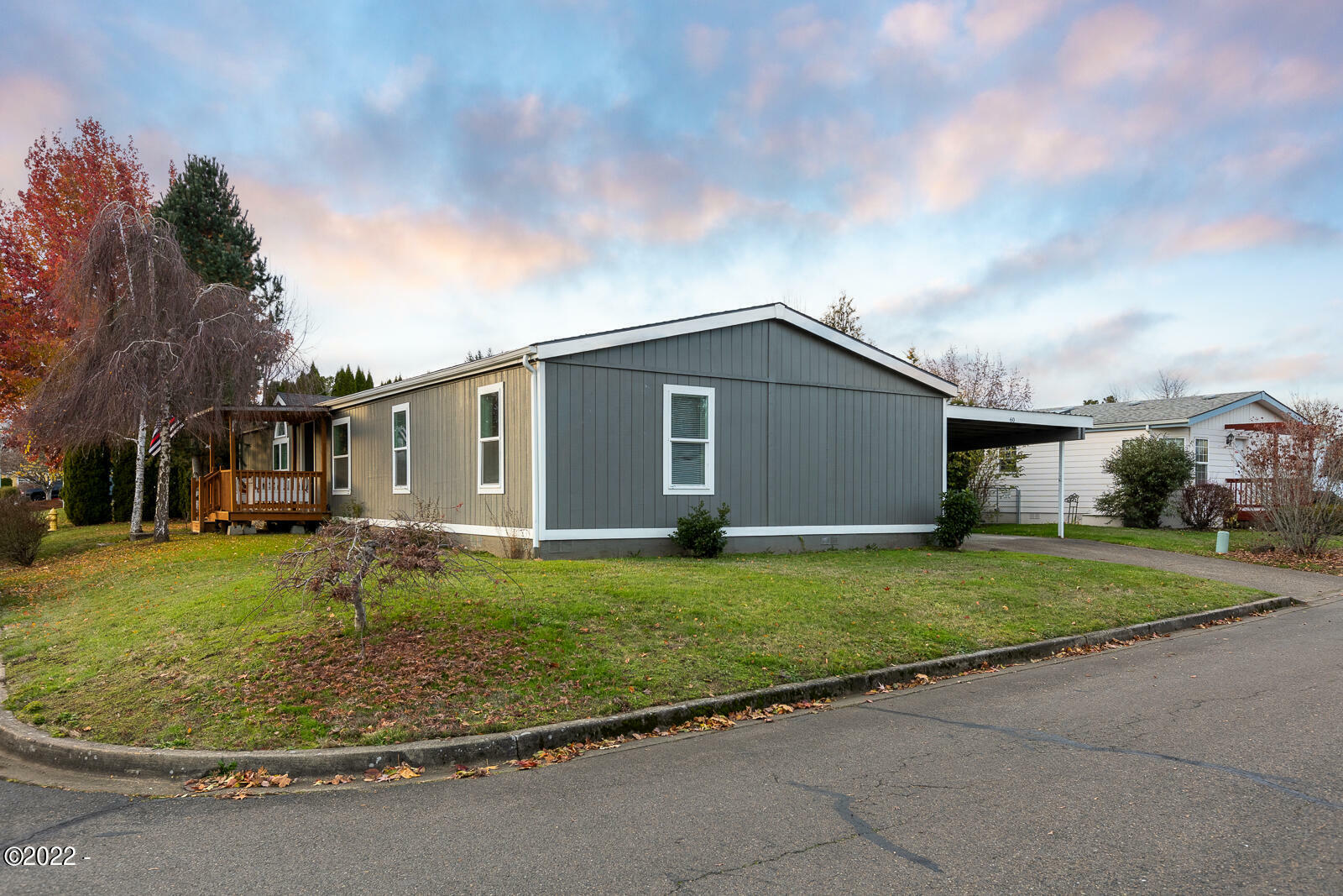 Property Photo:  655 NE Burnett Road 60  OR 97128 