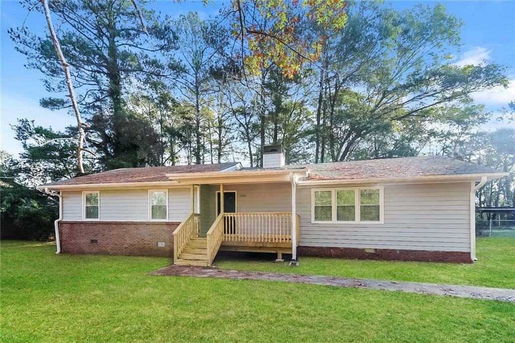Property Photo: 6386 Woodlawn Avenue GA 30273
