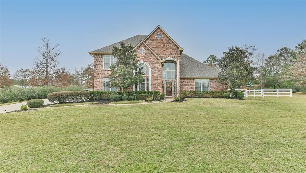 Property Photo: 9203 Grand Lake Estates Drive TX 77316