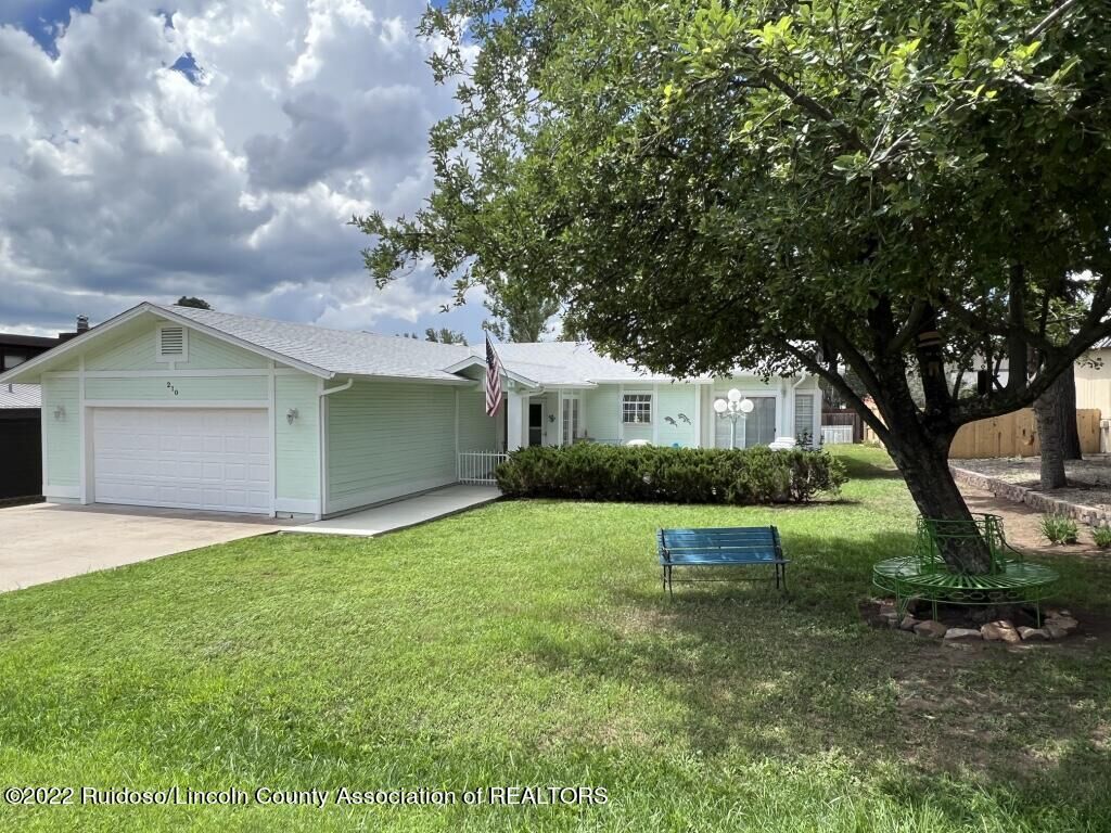 Property Photo:  210 E Rainbow Drive  NM 88345 