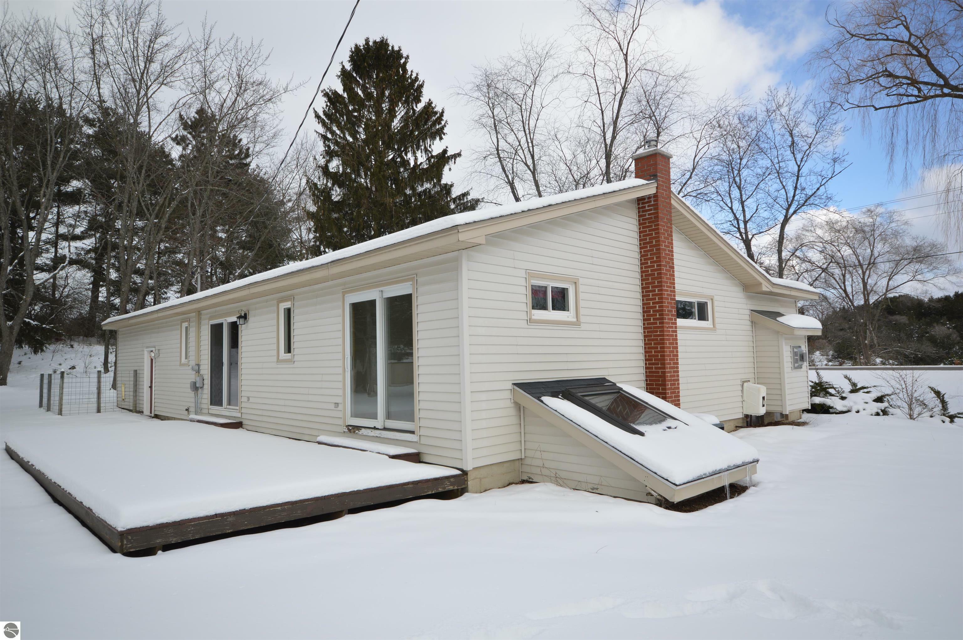 Property Photo:  411 N East Silver Lake Road  MI 49685 