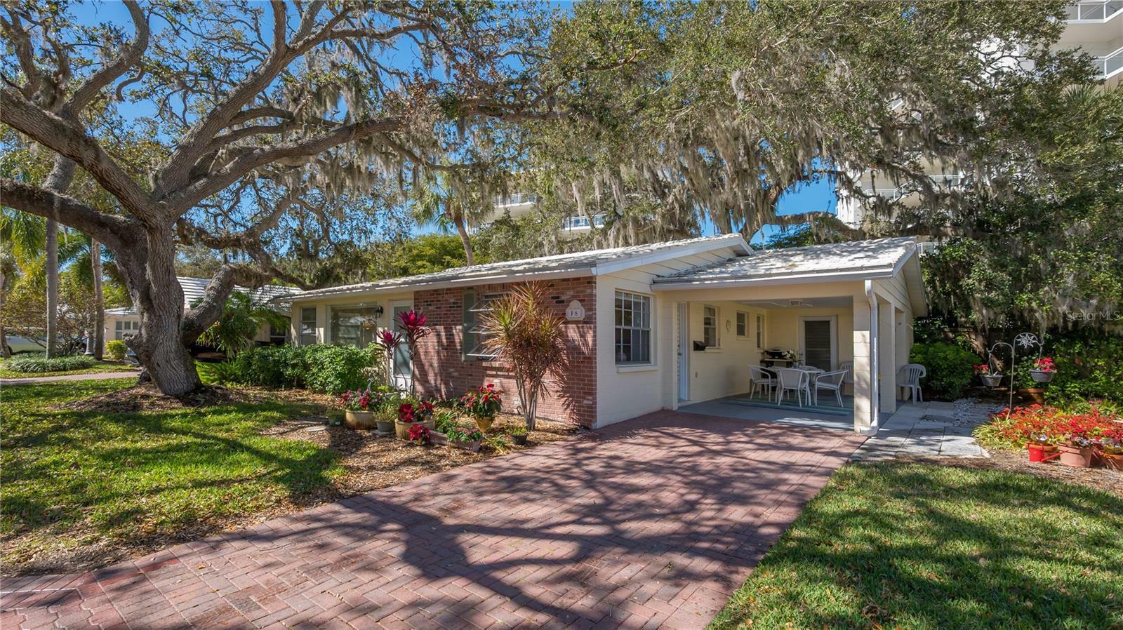 Property Photo:  6145 Midnight Pass Road Villa F-8  FL 34242 