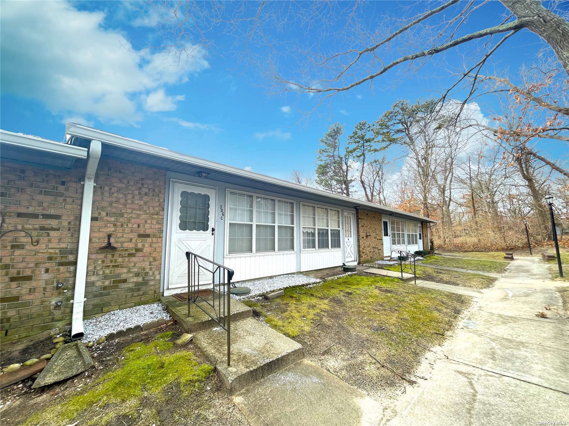 Property Photo: 306C Torquay Court NY 11961