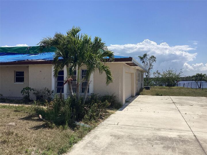 Property Photo: 3360 Peace River Drive FL 33983