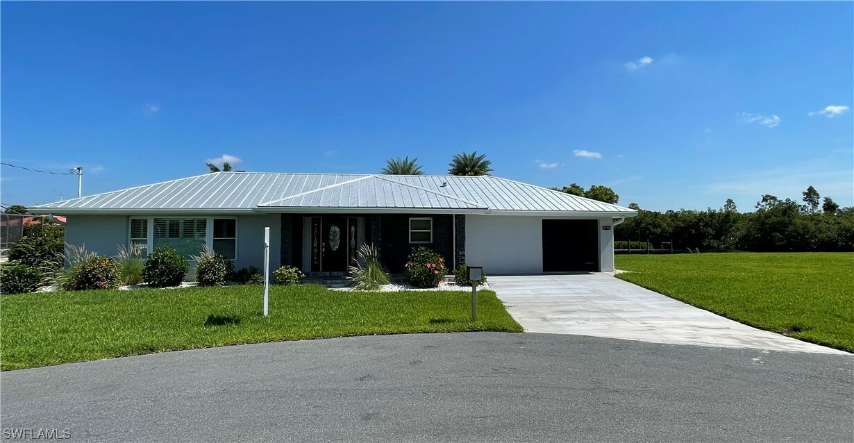 Property Photo: 1751 Castaway Street FL 33917