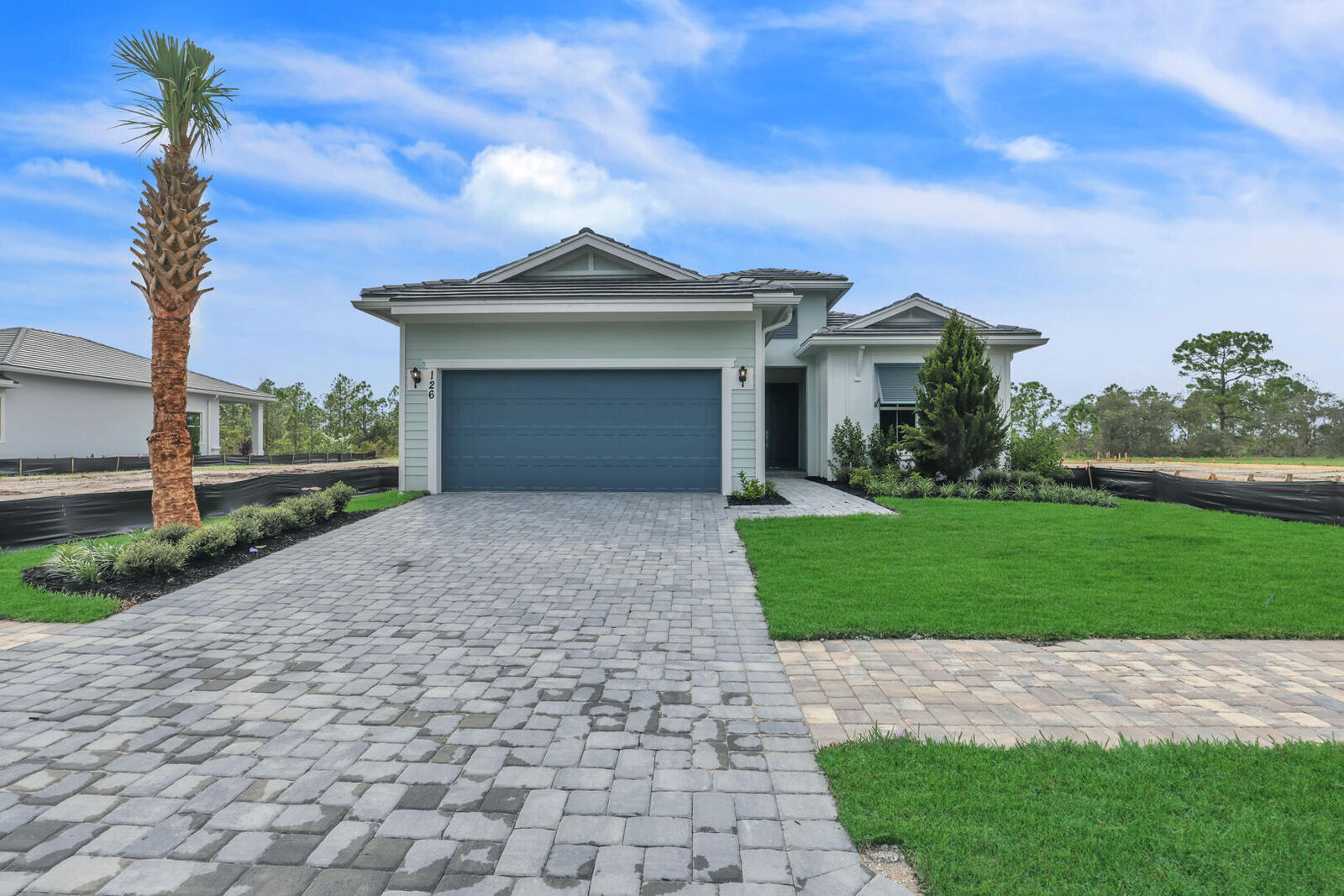 Property Photo:  126 SE Palma Street  FL 34984 