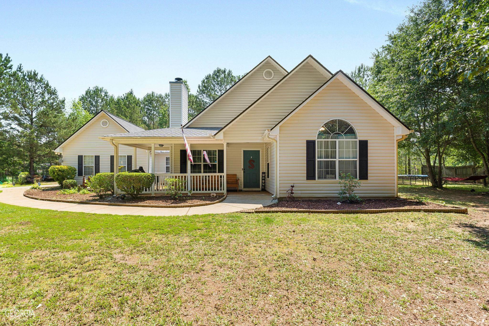 Property Photo:  6142 81 E Highway  GA 30252 