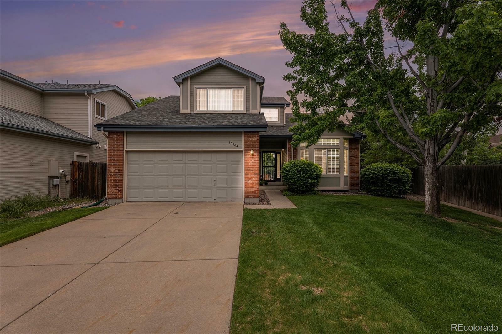Property Photo: 10704 E Colorado Avenue CO 80012