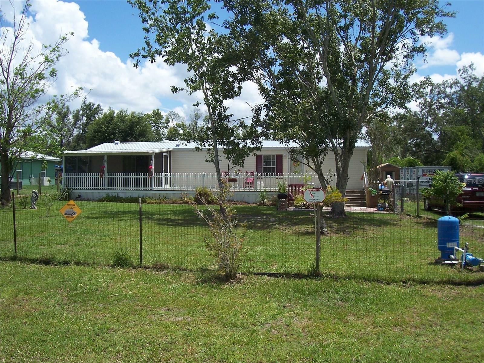 Property Photo:  3905 NW Green Tree Street  FL 34266 