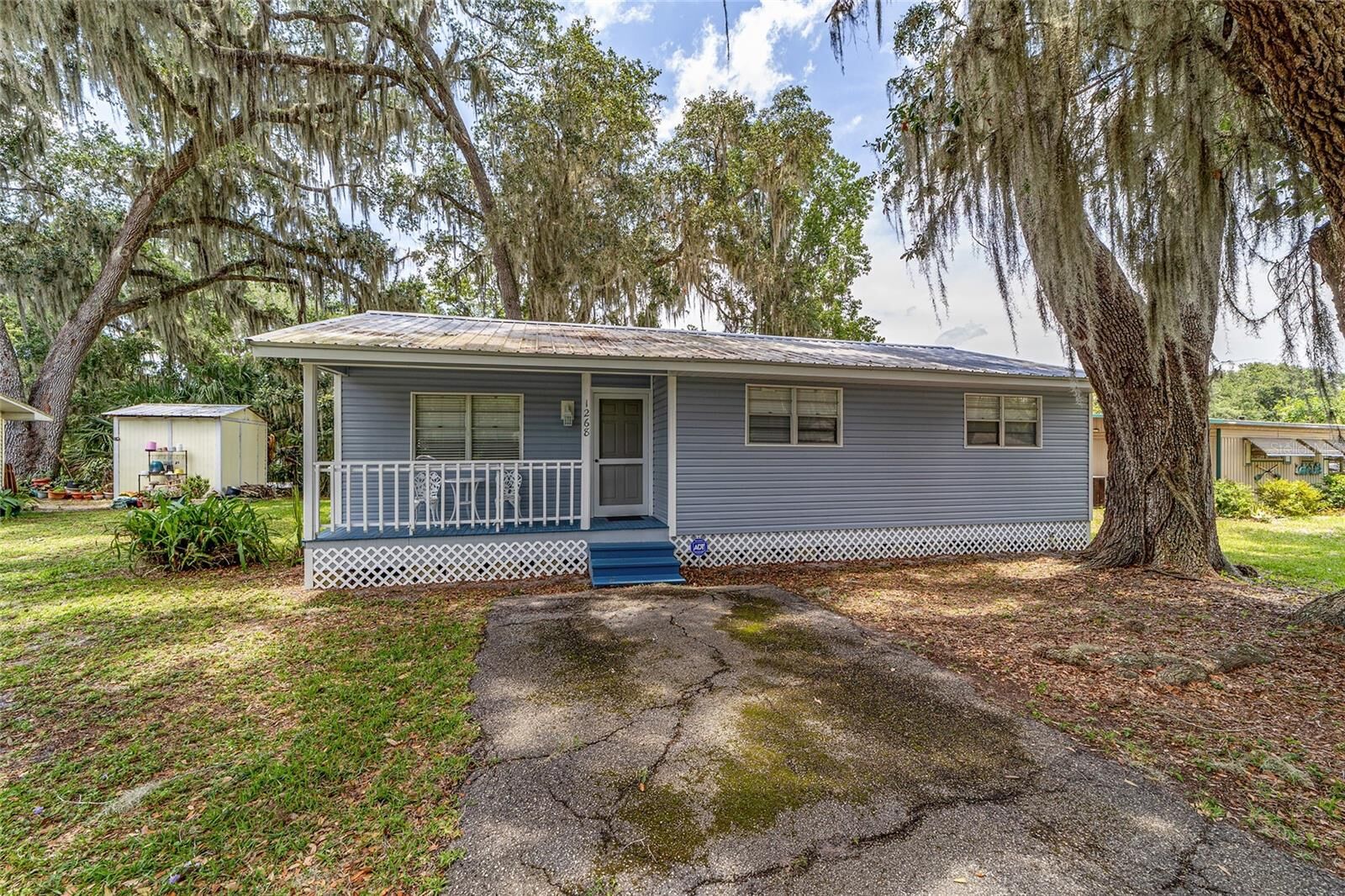 Property Photo:  1268 Cr 436  FL 33538 