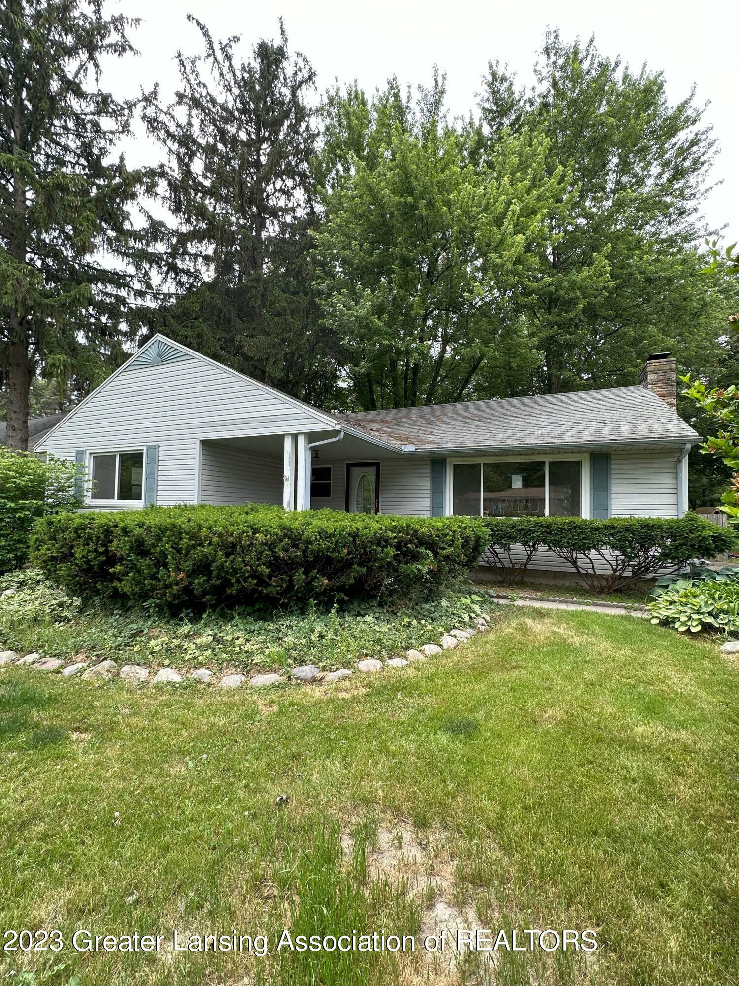 Property Photo:  811 Bretton Road  MI 48917 