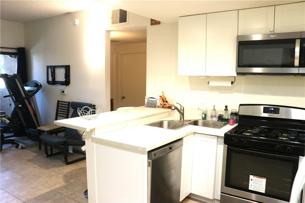 Property Photo:  10943 Laurel Canyon Boulevard 14  CA 91340 