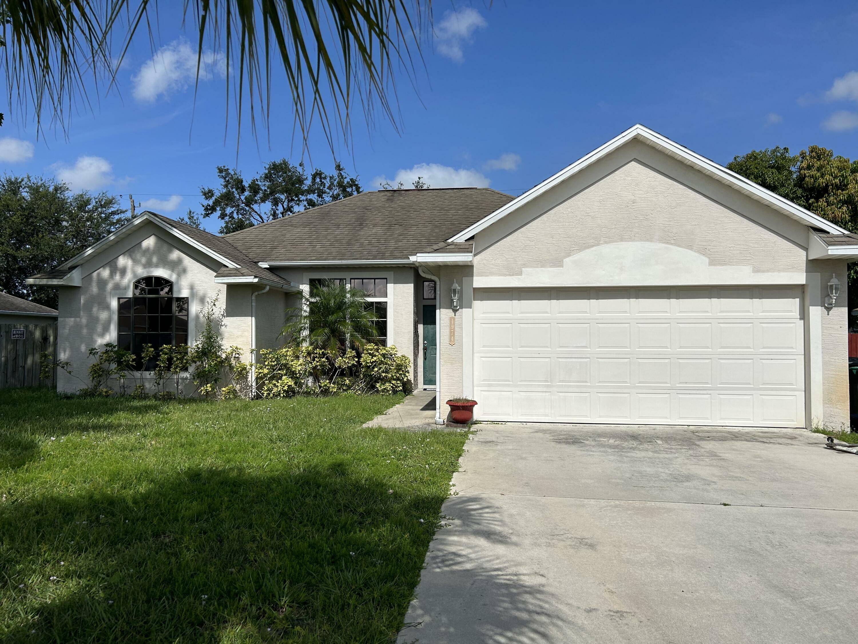 Property Photo:  1974 SW Beard Street  FL 34953 