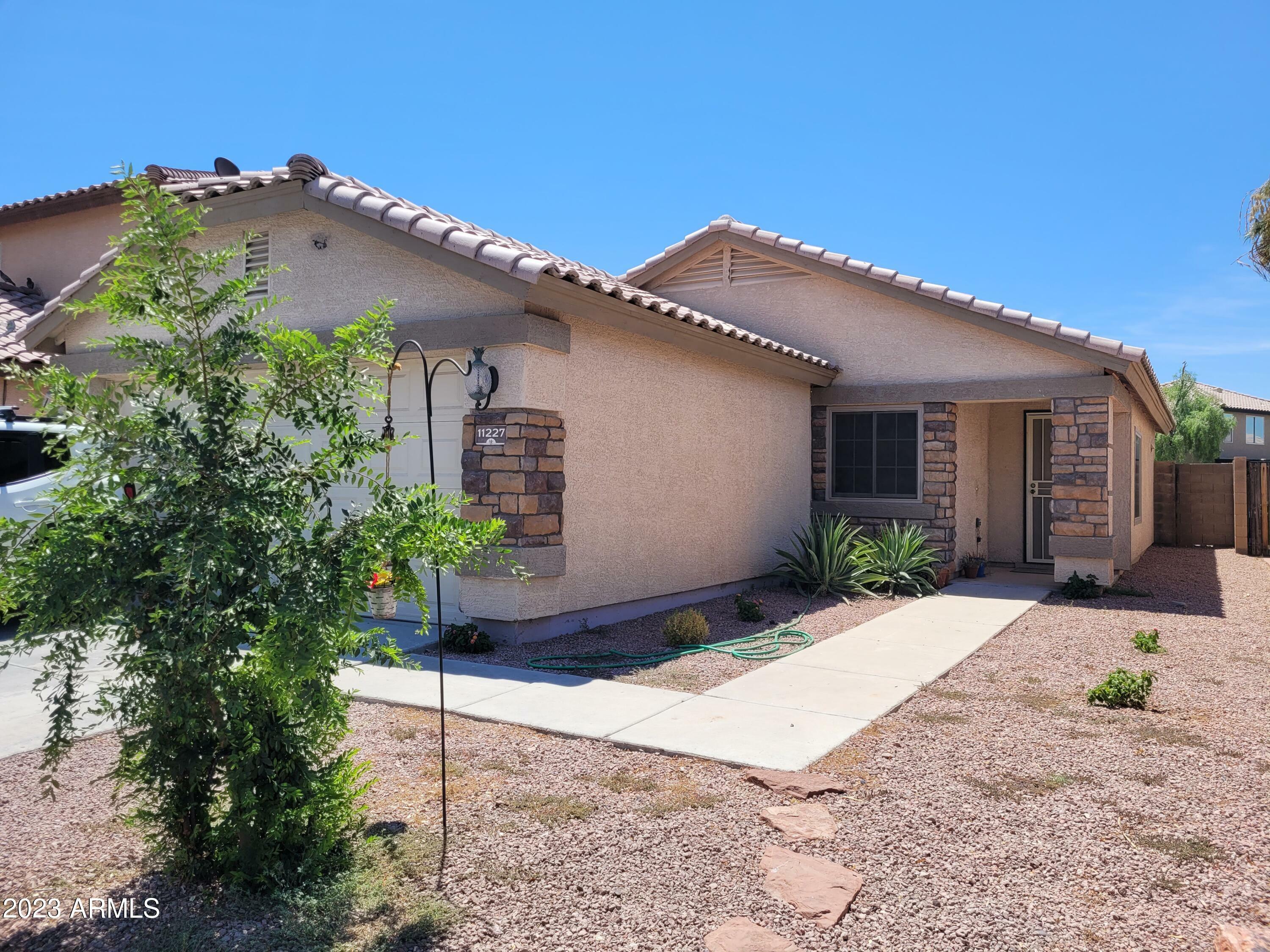 Property Photo:  11227 W Roma Avenue  AZ 85037 