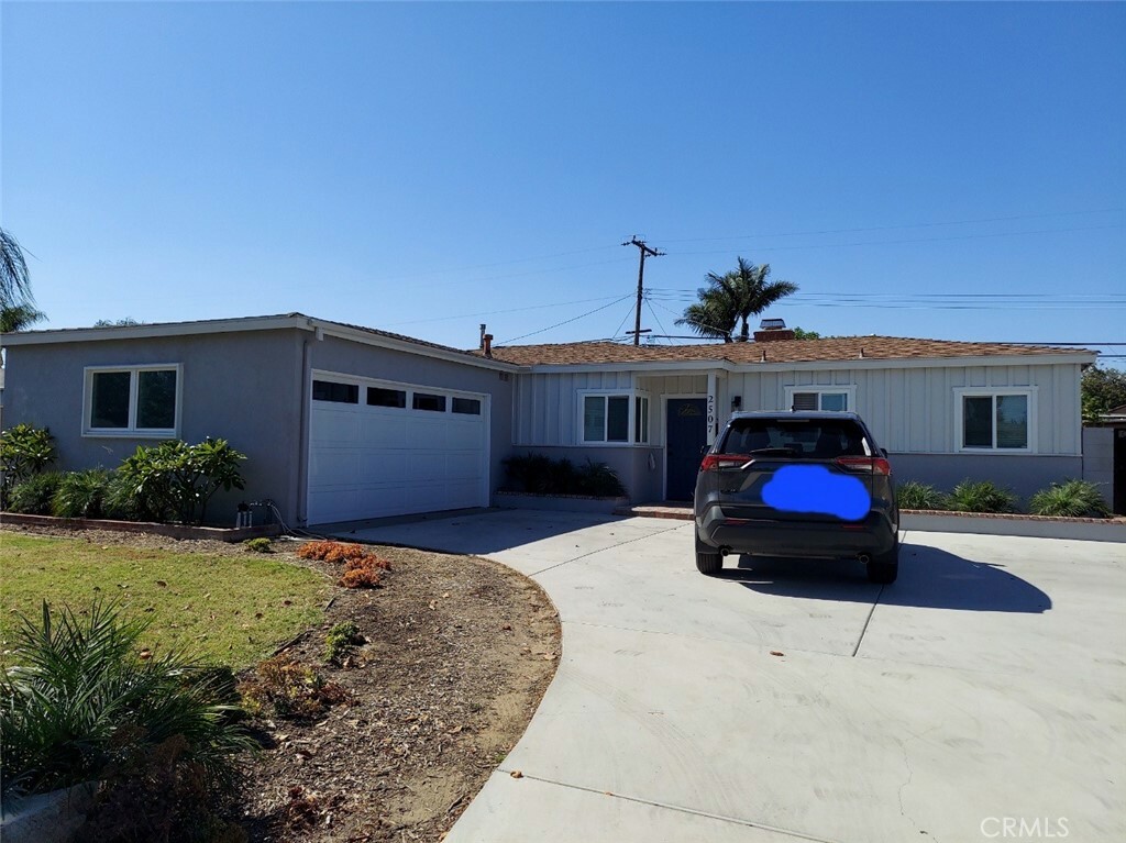 Property Photo:  2507 W Cherry Avenue  CA 92833 