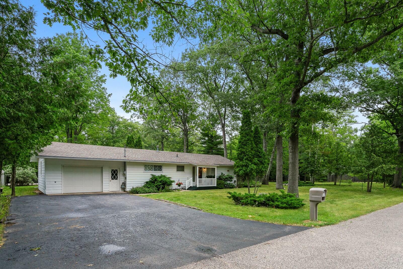 Property Photo:  6834 Bosserman Court  MI 49749 