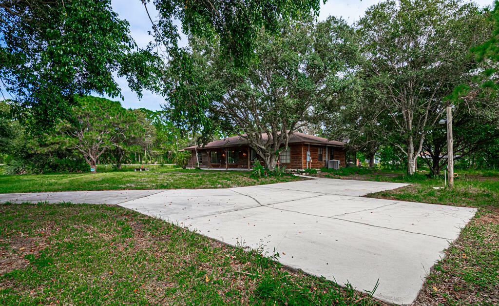 Property Photo:  15705 Tangelo Boulevard  FL 33412 