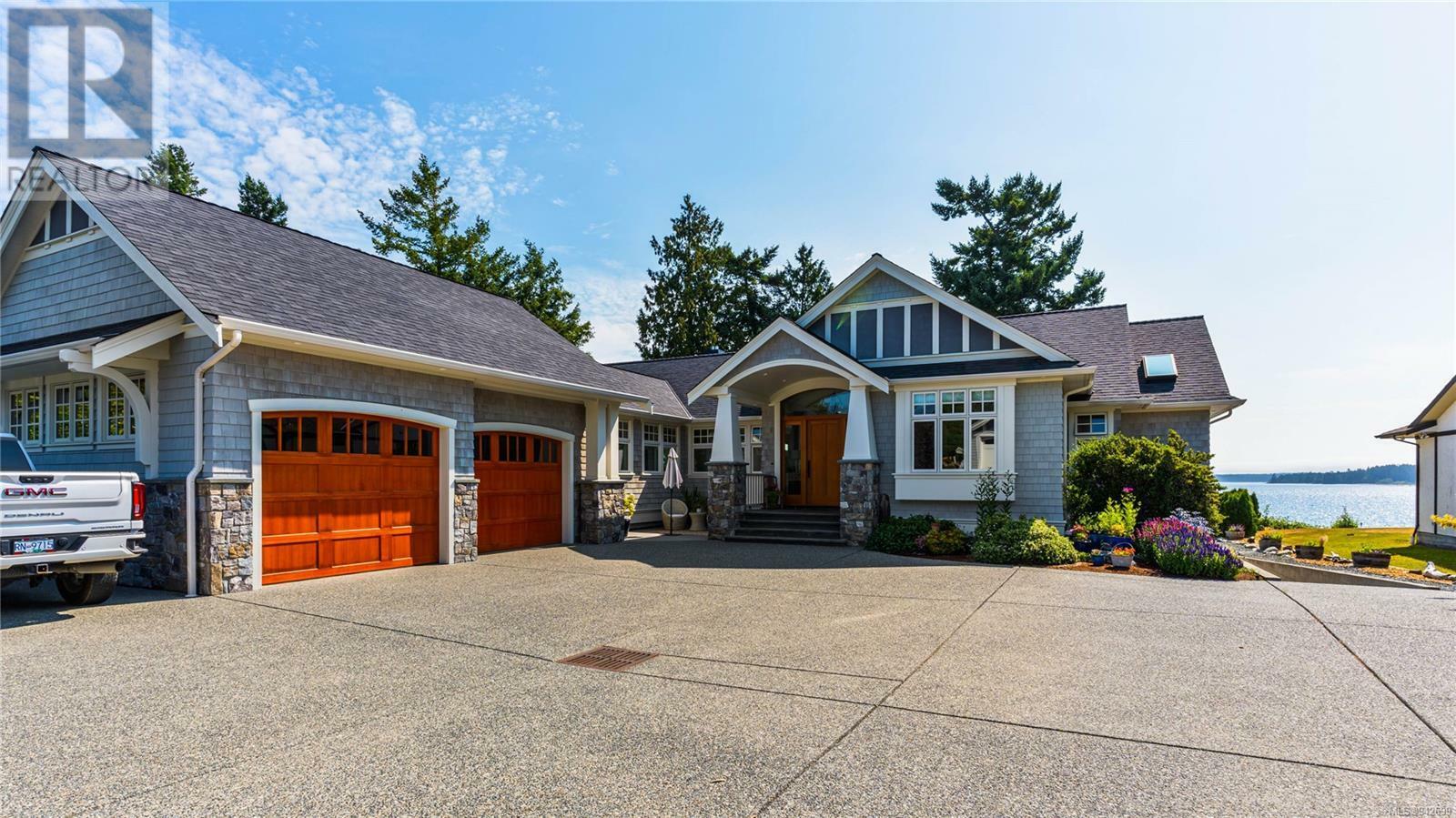 Property Photo:  8891 Lochside Drive  BC V8L1N1 