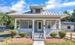 Property Photo:  215 E Grand River Avenue  MI 48895 