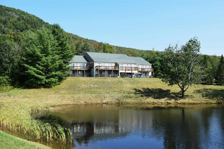 Property Photo:  166 Forest Ridge Drive 2  NH 03251 