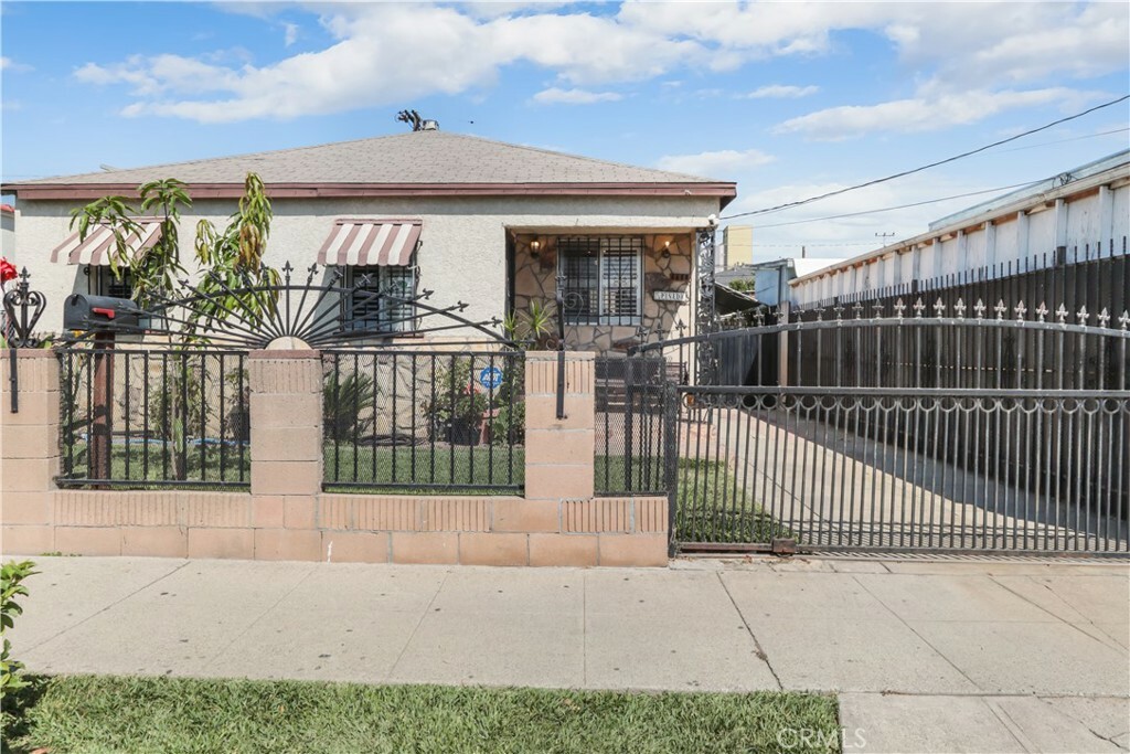 Property Photo:  1411 W 66th Street  CA 90047 