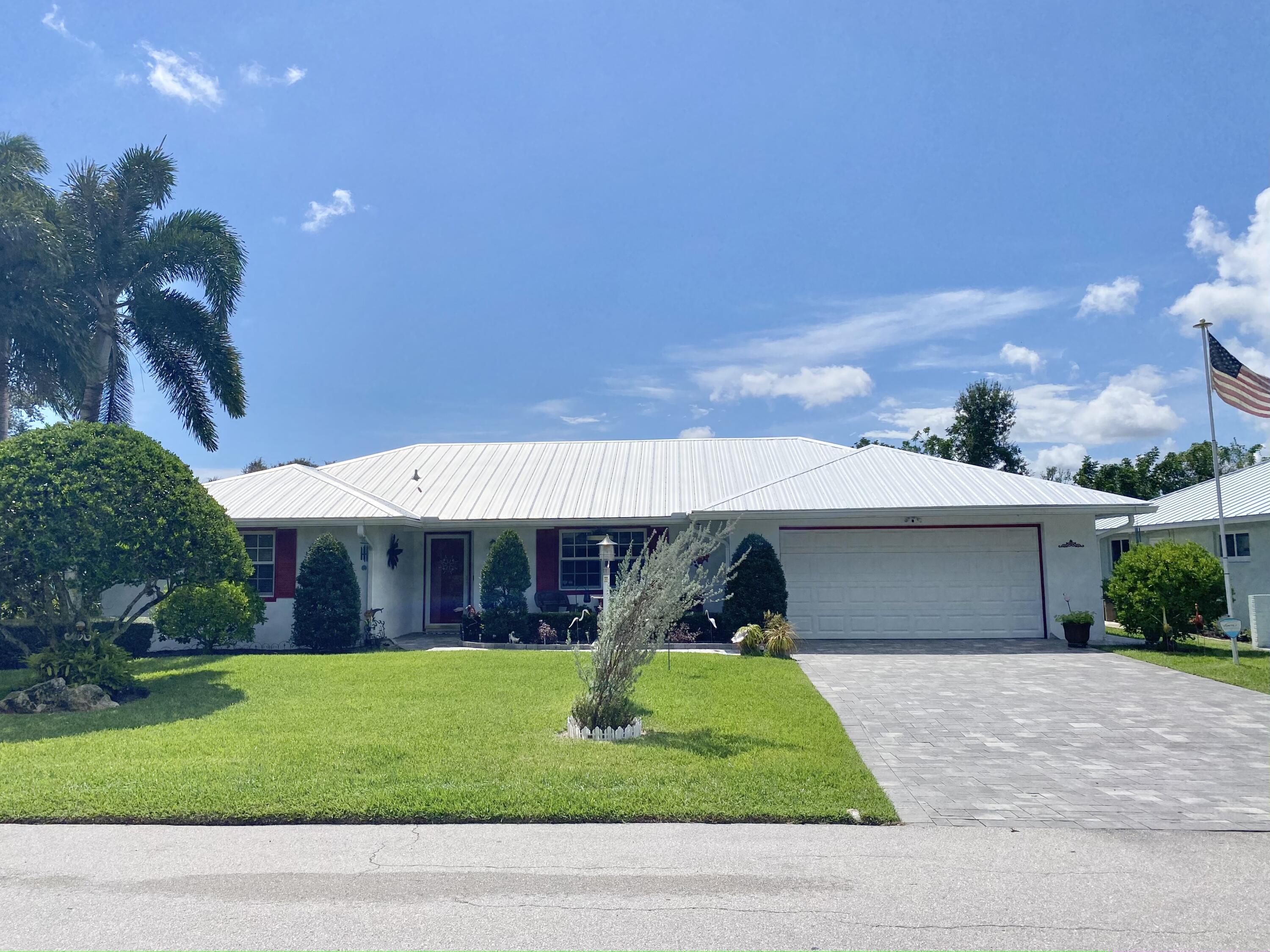 Property Photo:  9532 SE Little Club Way S  FL 33469 