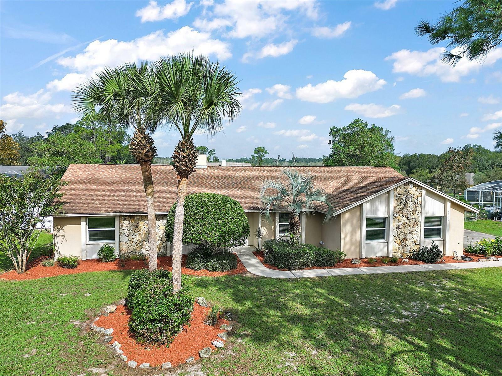 Property Photo:  5205 Twin Palms Road  FL 34731 