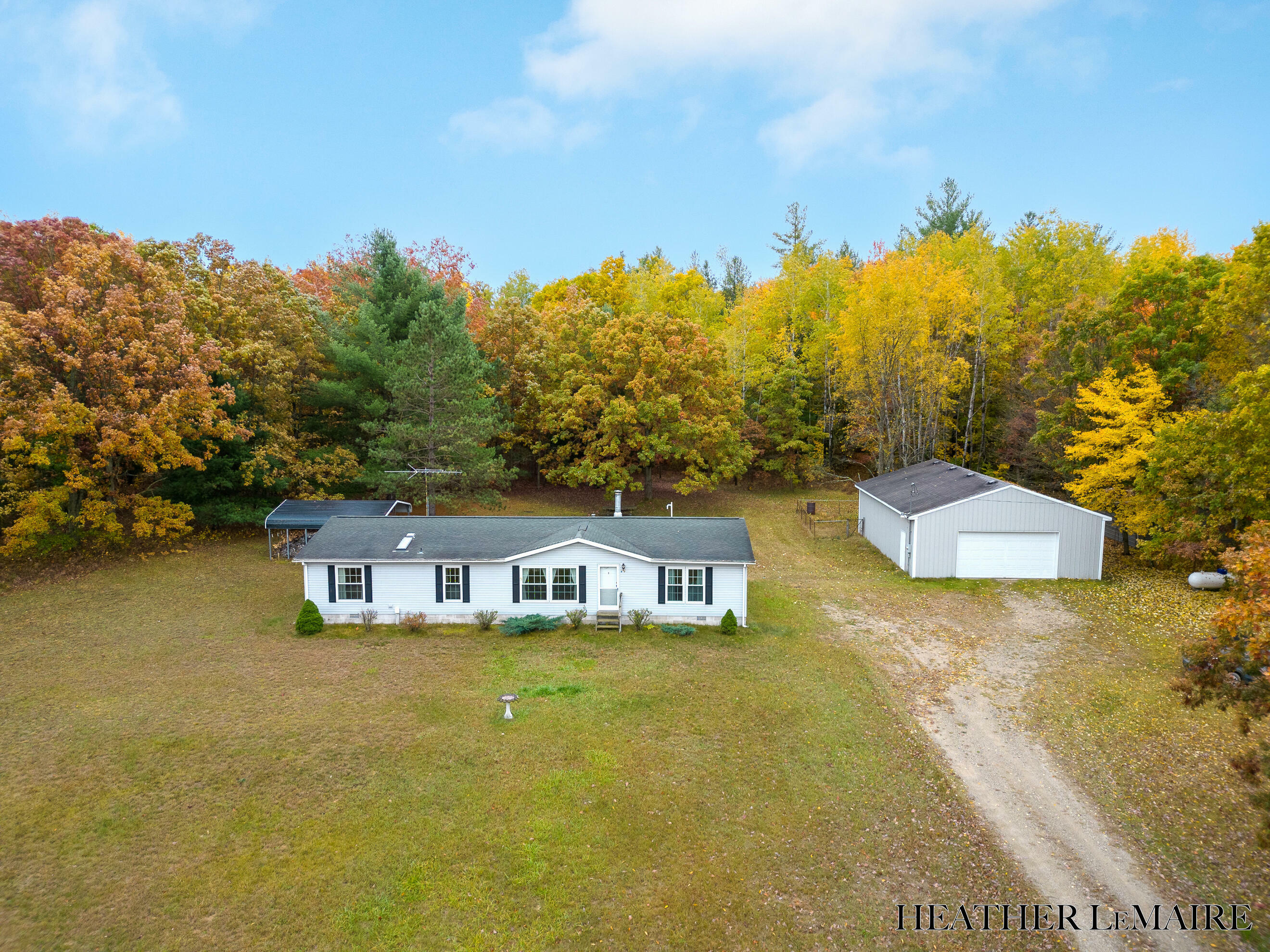 Property Photo:  6868 5 Mile Road  MI 49421 