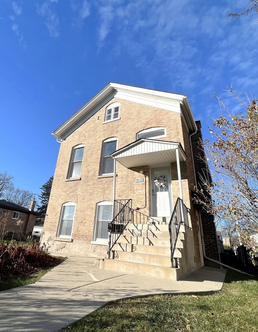 Property Photo:  7418 Kostner Avenue 1  IL 60076 