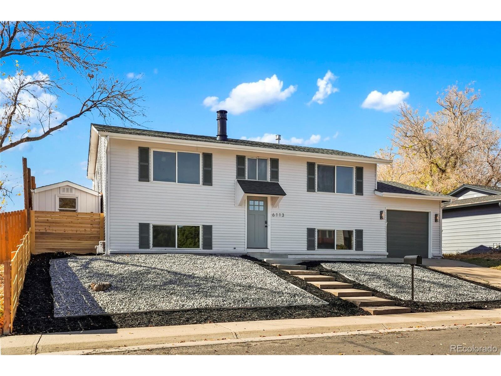 Property Photo: 6113 Dunraven St CO 80403