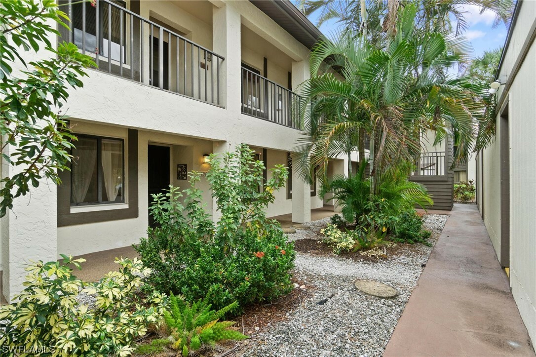 Property Photo:  5857 Rattlesnake Hammock Road 106  FL 34113 