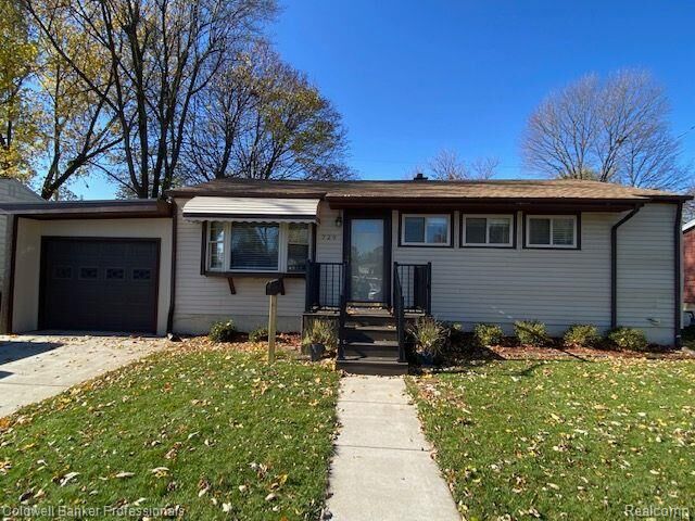 Property Photo: 729 Woodbine Drive MI 48430