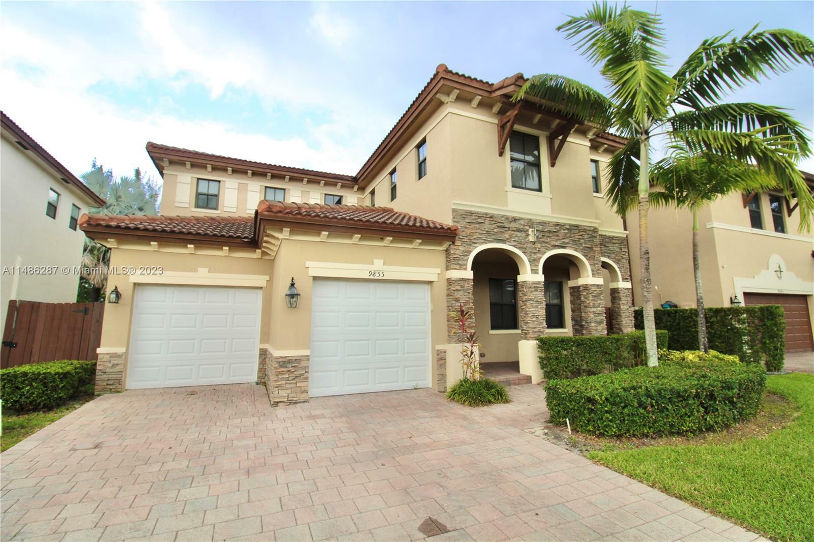 Property Photo:  9855 NW 89th Ter  FL 33178 