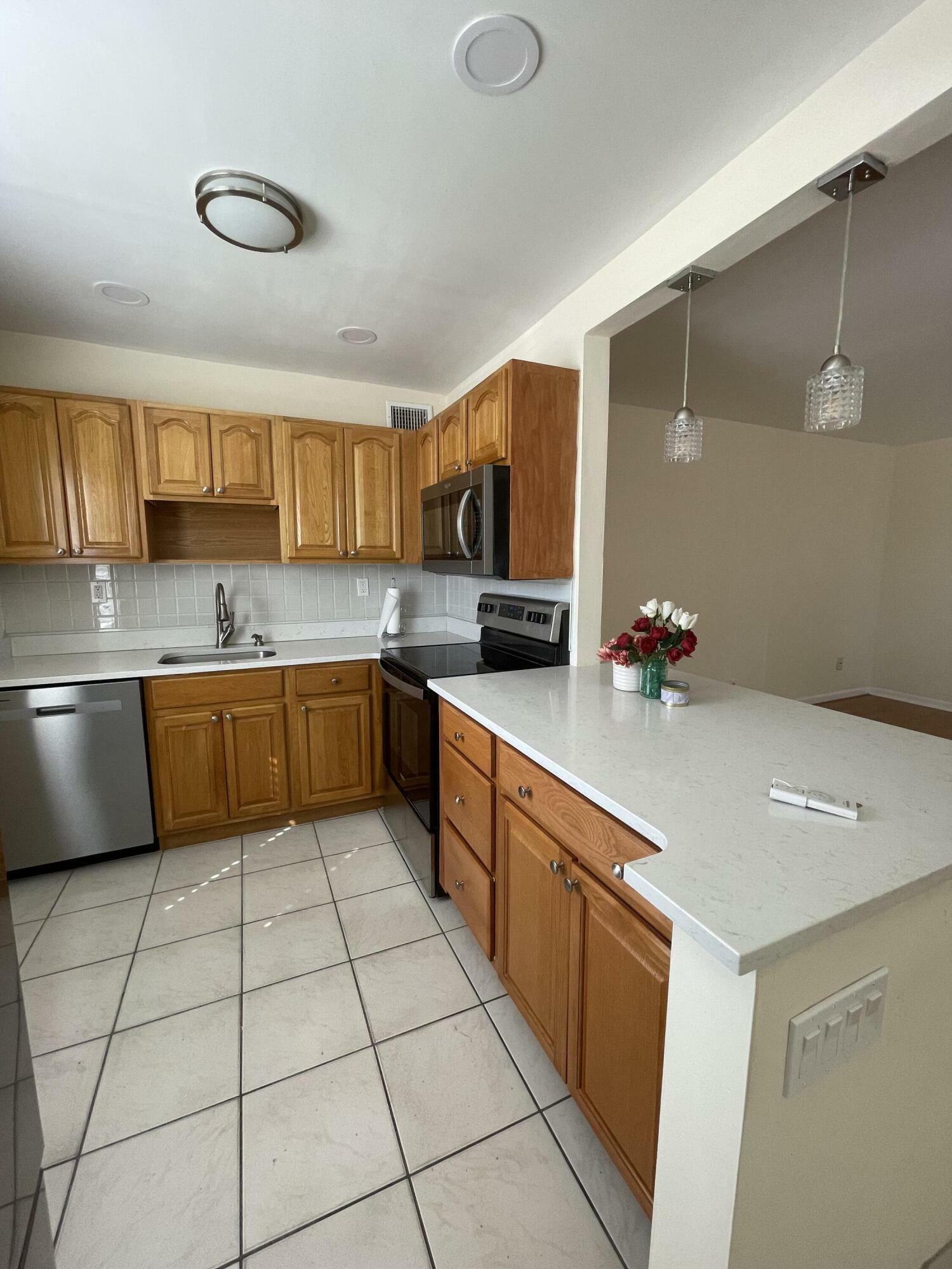 Property Photo:  313 Burgundy G  FL 33484 