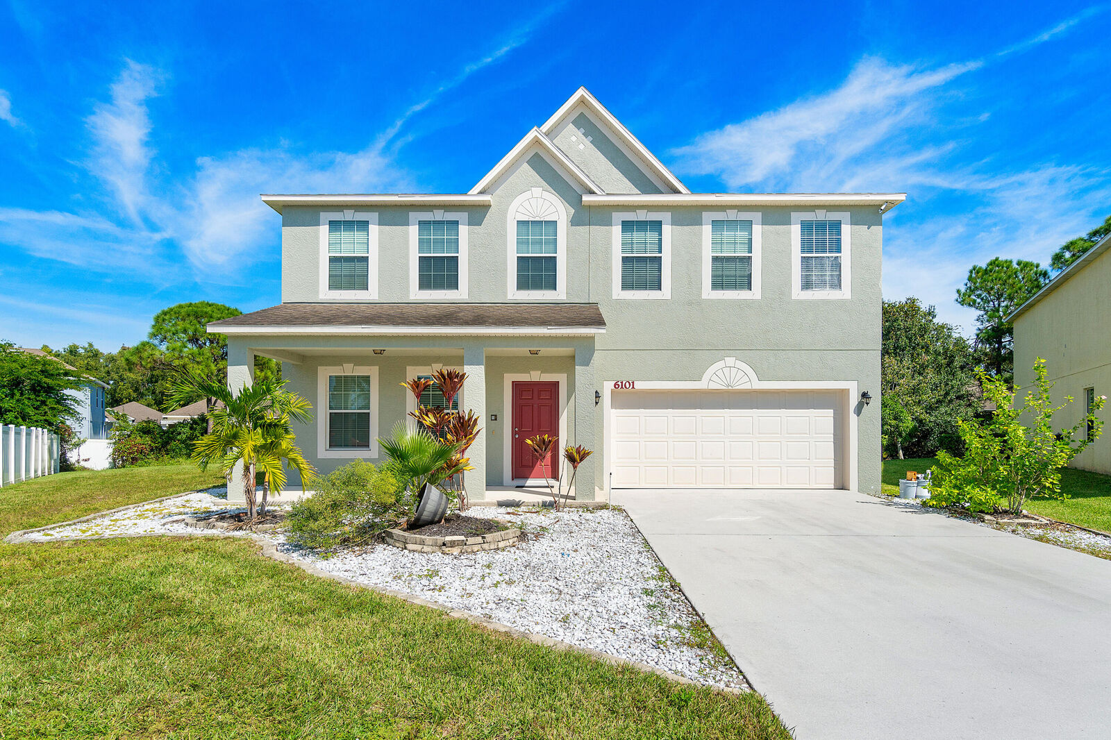 Property Photo: 6101 NW Butterfly Orchid Place FL 34986