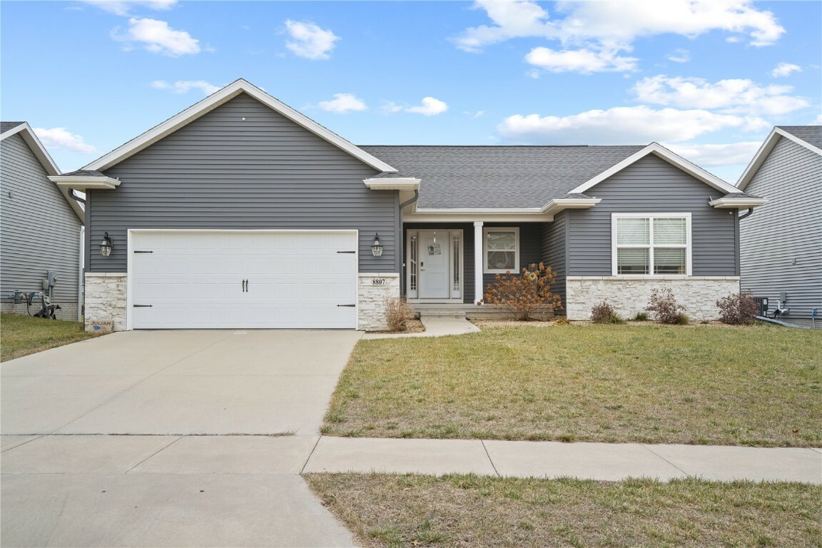 Property Photo:  8807 Grand Oaks Drive NE  IA 52402 