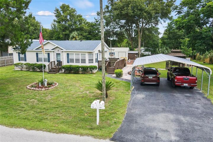 Property Photo:  10901 SE 131st Place  FL 32179 