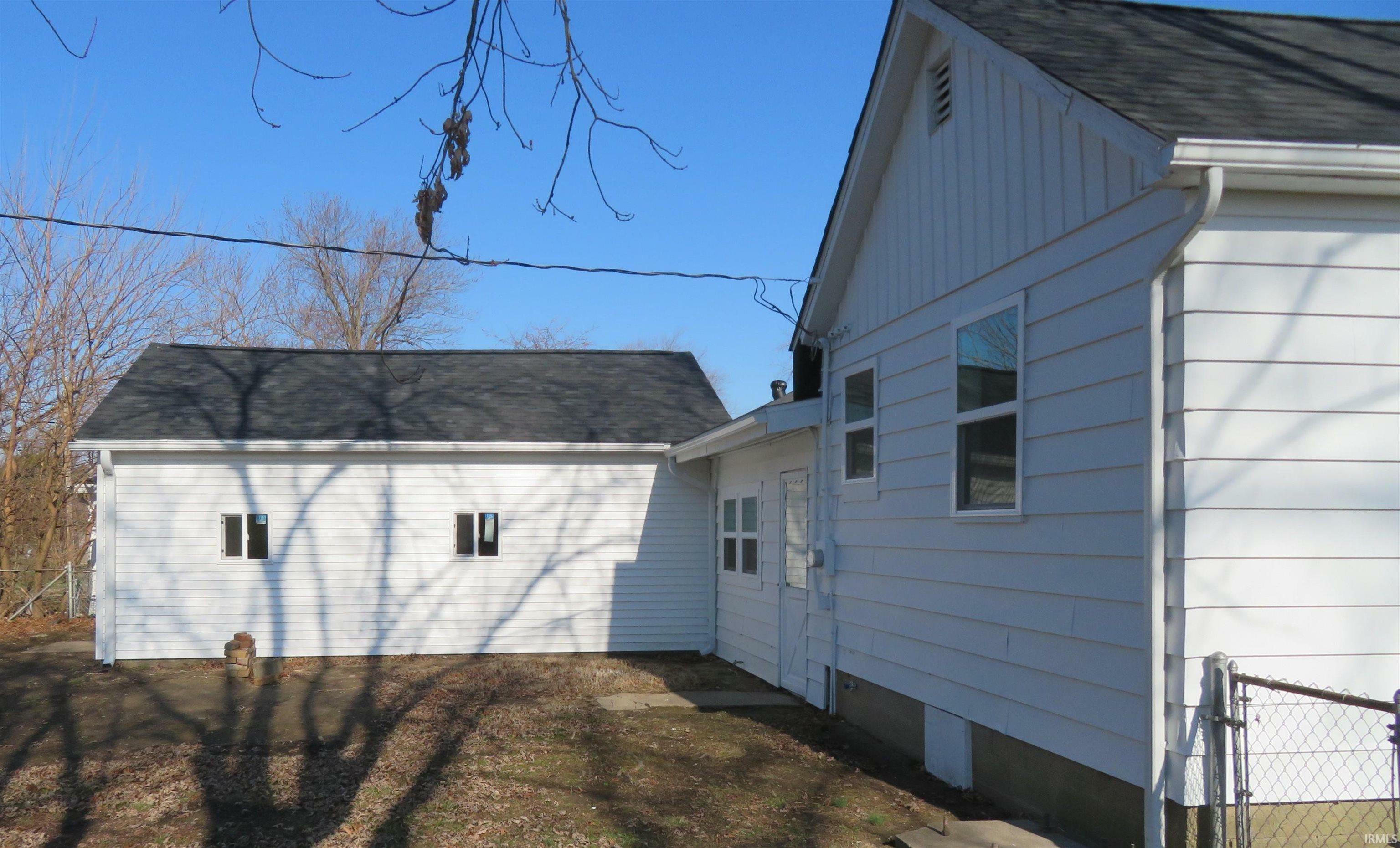 Property Photo:  5620 N Fares Avenue  IN 47711 