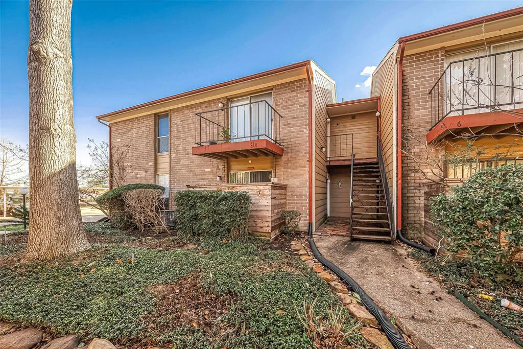 Property Photo: 12955 Woodforest Boulevard 8 TX 77015