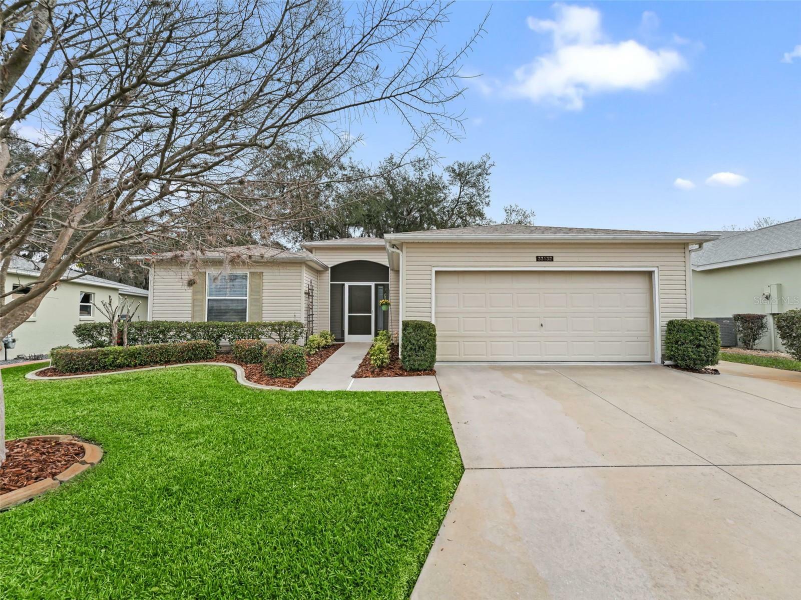 Property Photo:  33132 Grand Cypress Way  FL 34748 