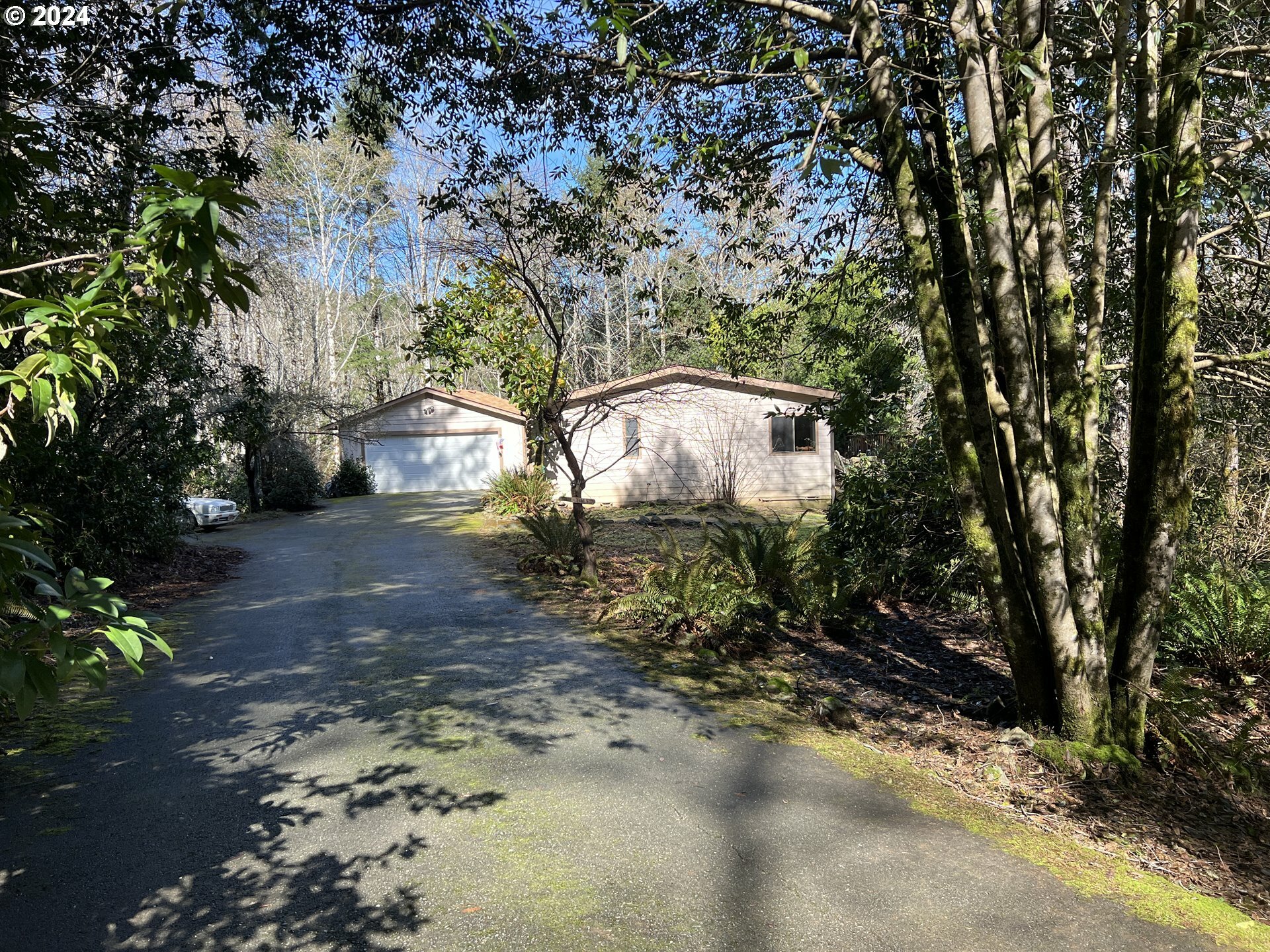 Property Photo:  16776 Salmonberry Rd  OR 97415 