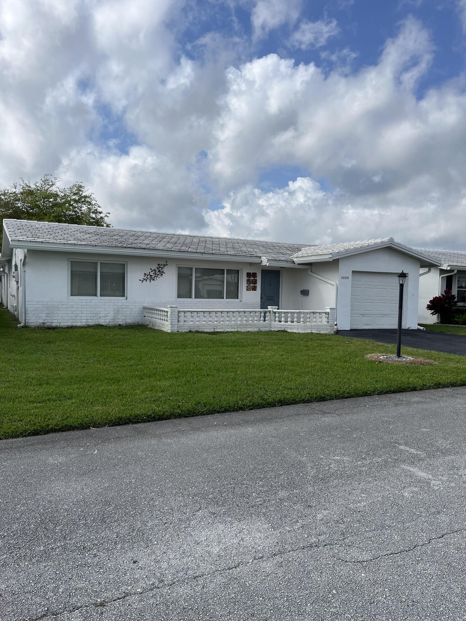 Property Photo:  2086 SW 12th Avenue  FL 33426 