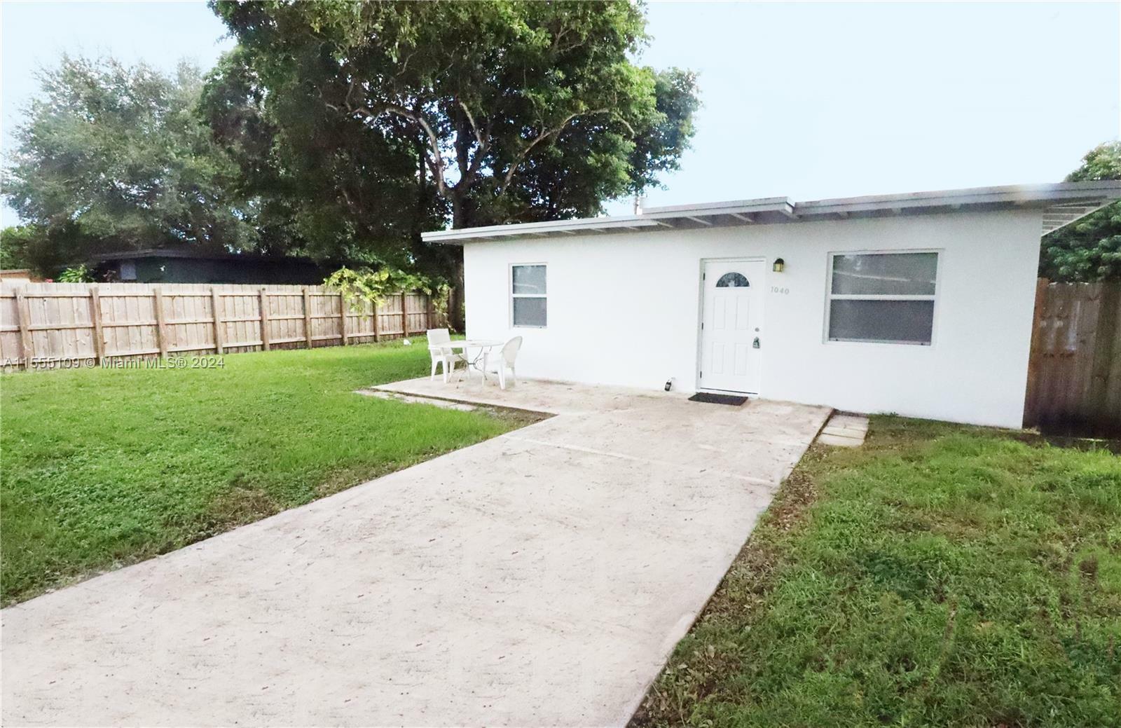 Property Photo:  1040 NW 141st St  FL 33168 