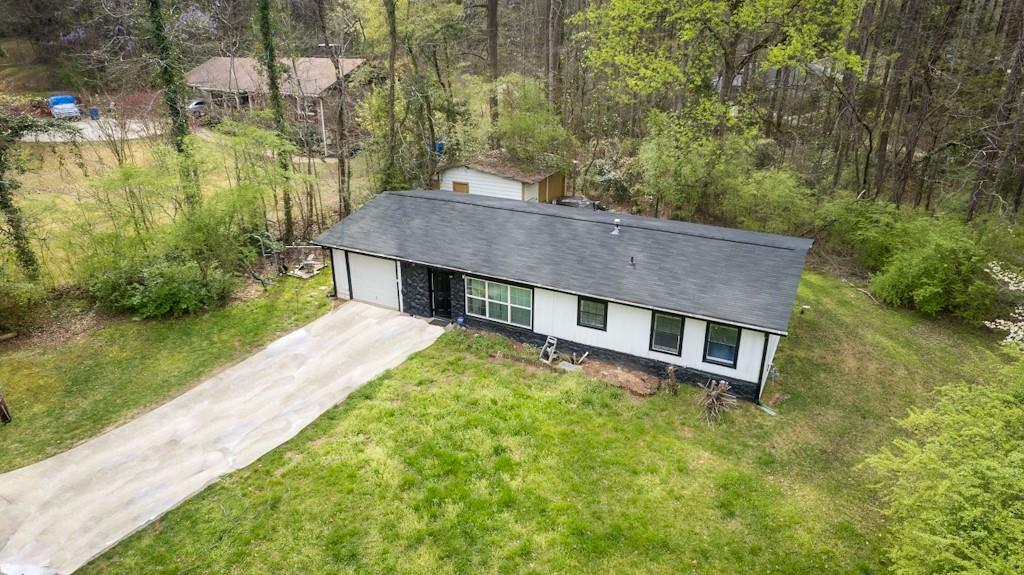 Property Photo:  3681 Stonewall Tell Road  GA 30349 