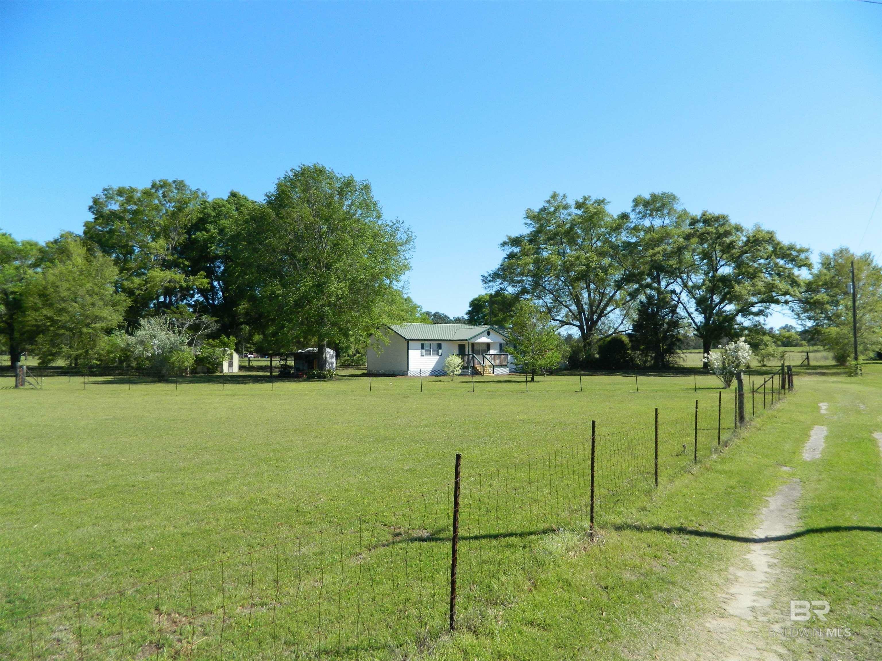 Property Photo:  7775 Iron Rush Road  AL 36587 