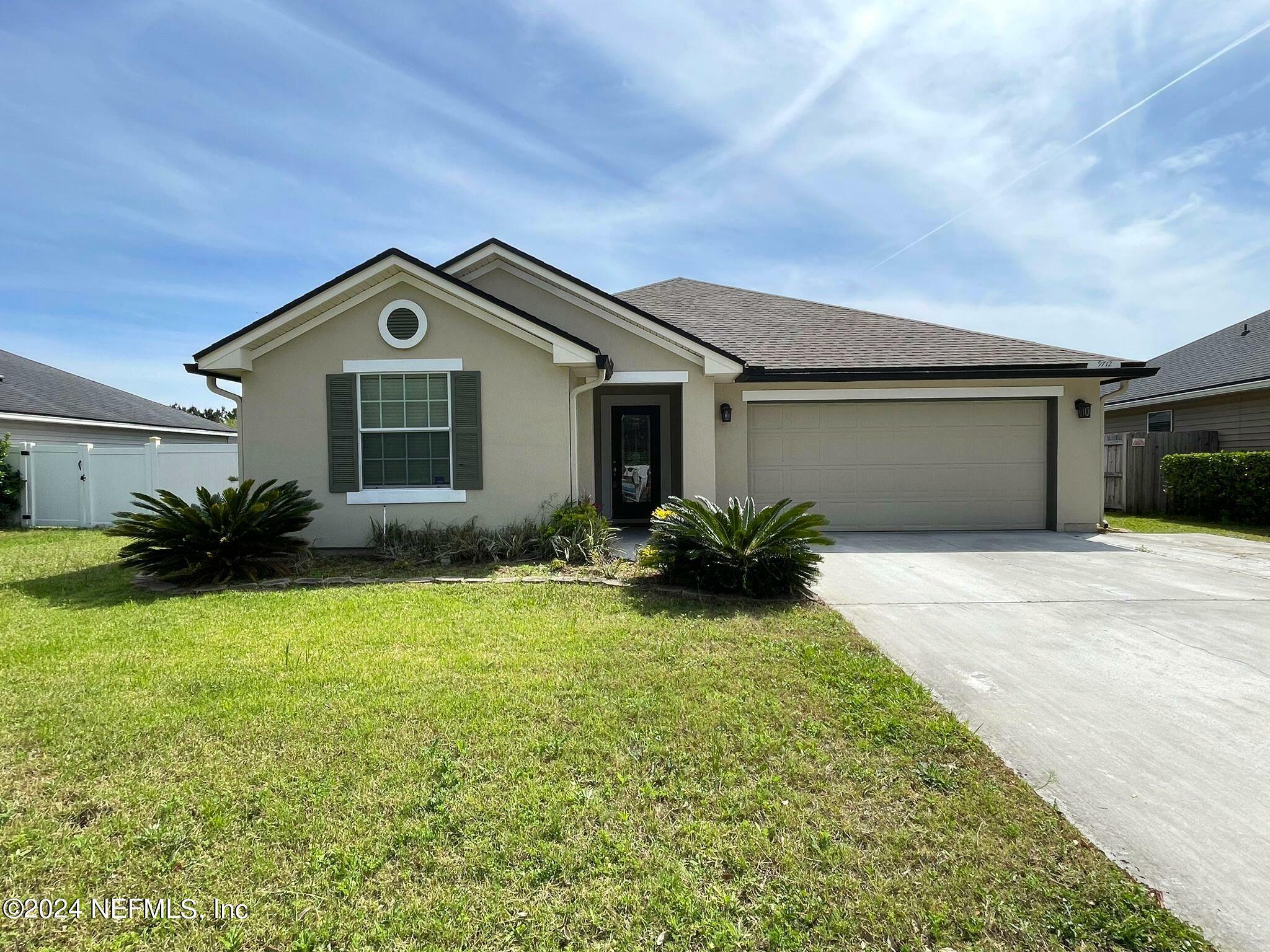 Property Photo:  9712 Woodstone Mill Drive  FL 32244 