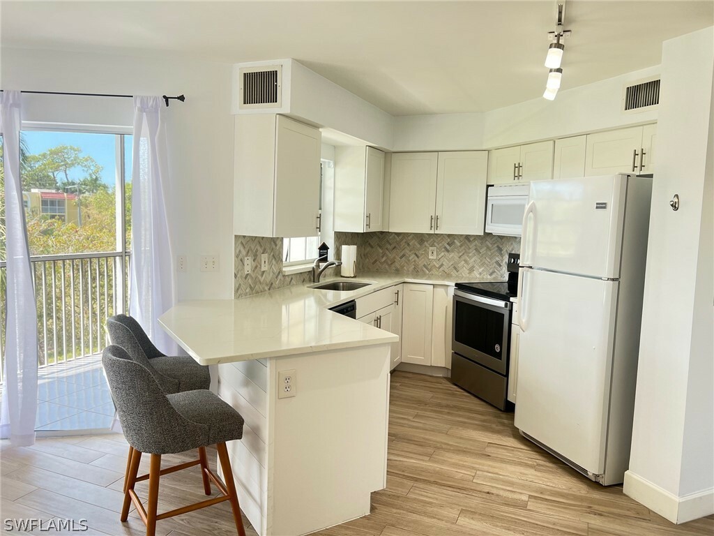 Property Photo:  441 Quail Forest Boulevard A308  FL 34105 