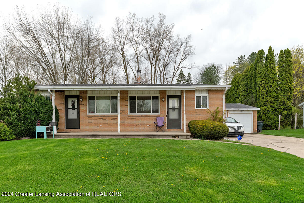 Property Photo:  1637/1639 Cambria Drive  MI 48823 